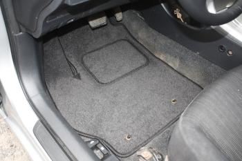 Коврики в салоне Toyota Corolla