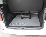 Коврики в салоне Volkswagen Caravelle, короткий кузов, крепления для сидения в проходе.